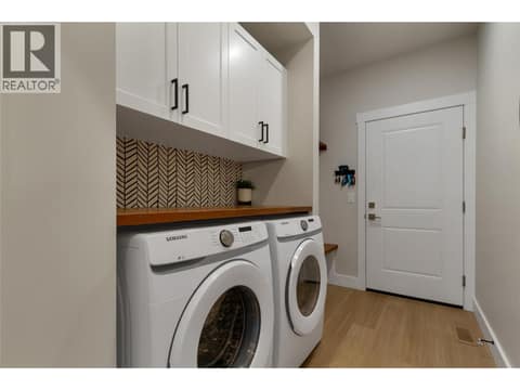 Laundry and mud room for the garage entrance at 1999 15 Avenue Unit# 9, East Hill, Vernon