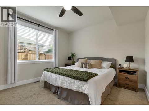 Primary bedroom on the main level. at 1999 15 Avenue Unit# 9, East Hill, Vernon