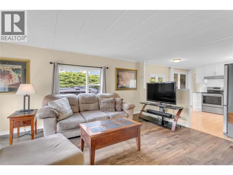 Bright, spacious living room. at 12022 Pretty Road Unit# 16, Lake Country South West