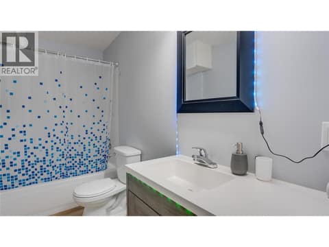 Basement: Full 4-piece bathroom with tub & shower downstairs as well! at 1041 Middleton Way Unit# 102, Middleton Mountain Vernon