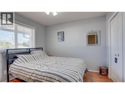 Main Floor: 2nd Bedroom. at 1041 Middleton Way Unit# 102, Middleton Mountain Vernon