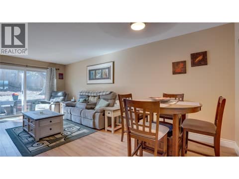 Main Floor: Dining area & Living Room. at 1041 Middleton Way Unit# 102, Middleton Mountain Vernon