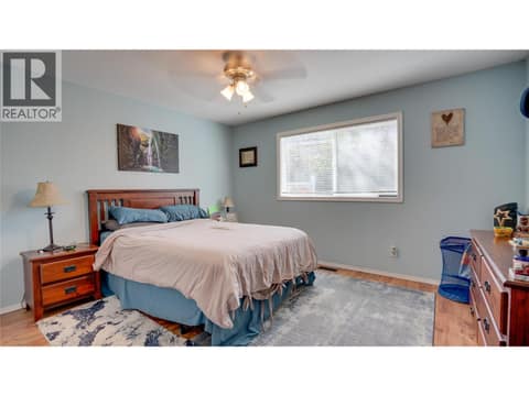Main Floor: Primary Bedroom. at 1041 Middleton Way Unit# 102, Middleton Mountain Vernon