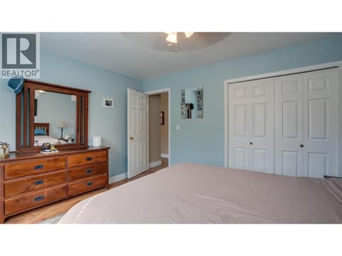 Main Floor: Primary Bedroom. at 1041 Middleton Way Unit# 102, Middleton Mountain Vernon