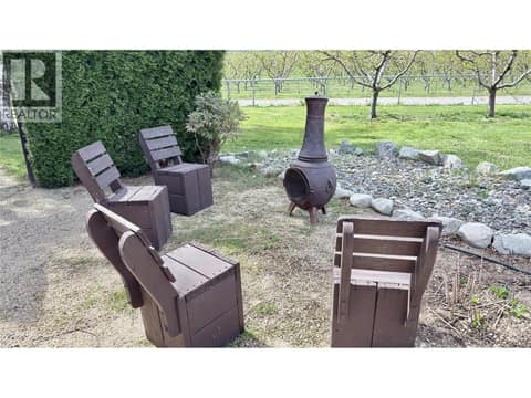 Firepit off the deck of family home at 15230 89th Street, Osoyoos Rural