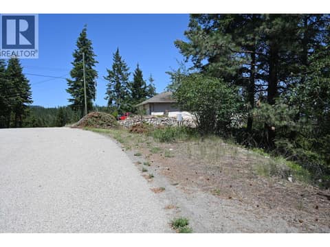 Columbia Way road to lot entry. at 10579 Columbia Way, Okanagan North, Vernon