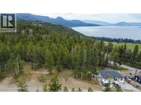 Lot is the one to the left of the home 75 ft x 120ft at 550 Muir Road, Fintry, Kelowna