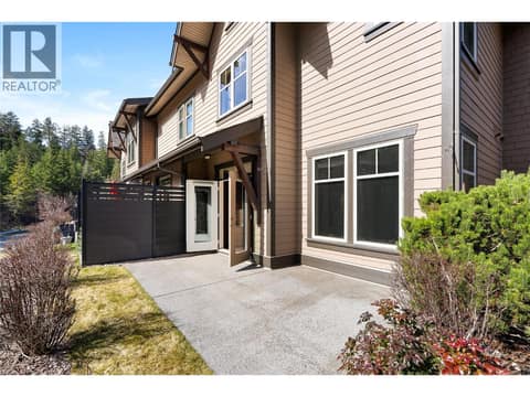 Back patio with privacy screen at 333 Longspoon Drive Unit# 35, Predator Ridge, Vernon
