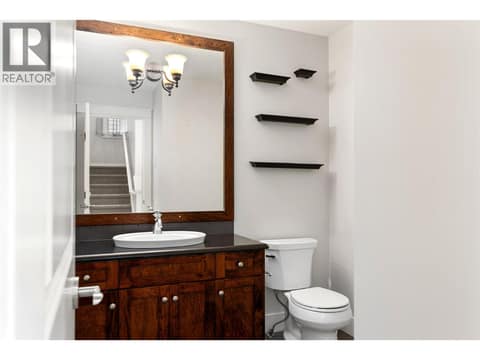 Half Bath on Main Level at 333 Longspoon Drive Unit# 35, Predator Ridge, Vernon