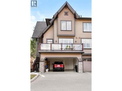 Large end unit with double car garage at 333 Longspoon Drive Unit# 35, Predator Ridge, Vernon