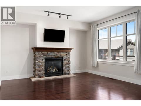 Living Room with hardwood flooring at 333 Longspoon Drive Unit# 35, Predator Ridge, Vernon