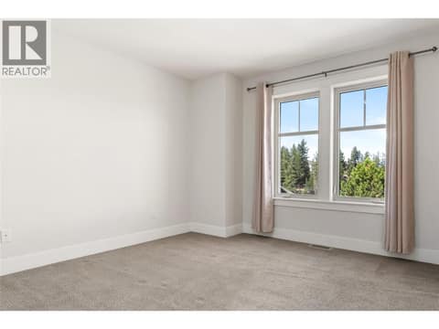 Primary Bedroom with ensuite at 333 Longspoon Drive Unit# 35, Predator Ridge, Vernon