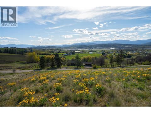 Backyard of orchards, vineyards, and mountains stretch to the horizon. Pure Okanagan postcard. at 5152 Whitetail Drive, Ellison, Kelowna