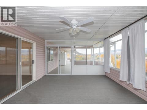Enclosed patio doors at 3929 22 Avenue Unit# 309, Mission Hill, Vernon