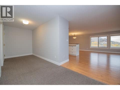 Entryway to living and kitchen at 3929 22 Avenue Unit# 309, Mission Hill, Vernon