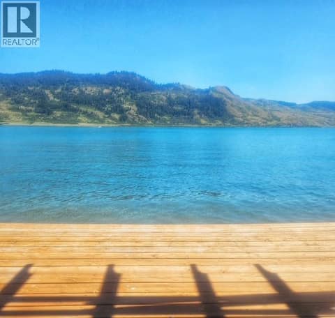 Deck right at the water's edge at 6 Goat Trail Road, Okanagan North, Vernon