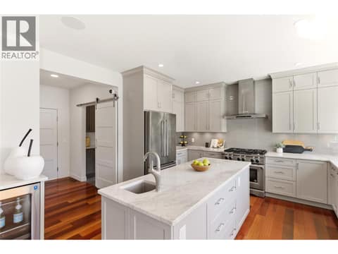 Fully updated kitchen with large windows to take in the lake views at 2090 Bennett Road, McKinley Landing, Kelowna