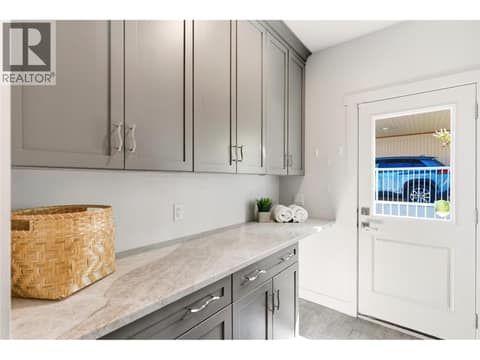 Main floor laundry at 2090 Bennett Road, McKinley Landing, Kelowna