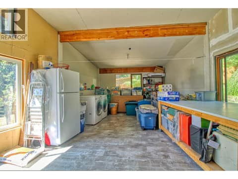 Entry foyer/laundry at 405 Kildare Way, Okanagan North, Vernon