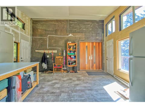 Entry foyer/laundry at 405 Kildare Way, Okanagan North, Vernon