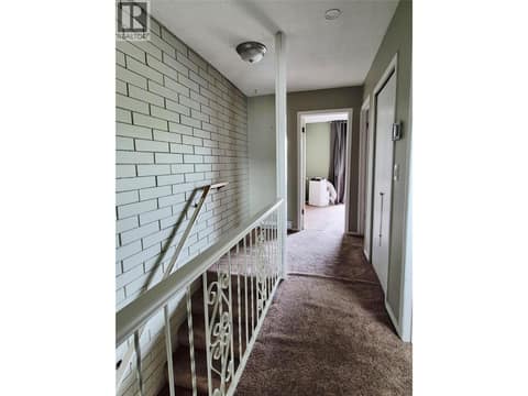 Hallway to primary bedroom at 4102 24 Avenue Unit# 2, South Vernon