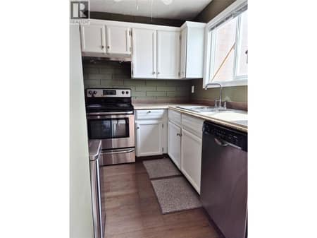 Kitchen to the right at 4102 24 Avenue Unit# 2, South Vernon