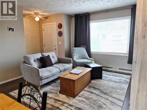 Living room with door access to the front yard at 4102 24 Avenue Unit# 2, South Vernon