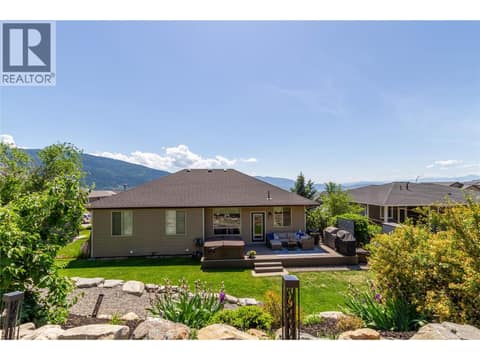 AMAZING backyard with newer retaining walls, trex deck and hot tub at 1449 Red Mountain Place, Foothills, Vernon