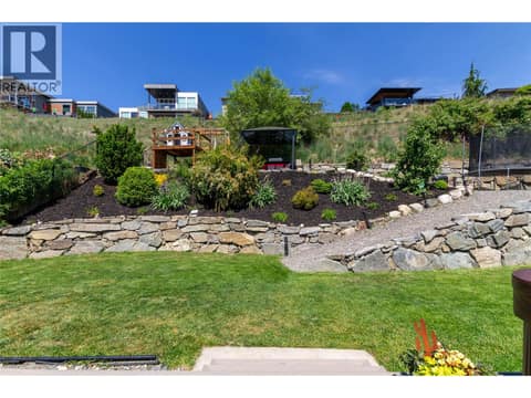 Landscaping just complete -  rock walls and tiering professionally done. at 1449 Red Mountain Place, Foothills, Vernon