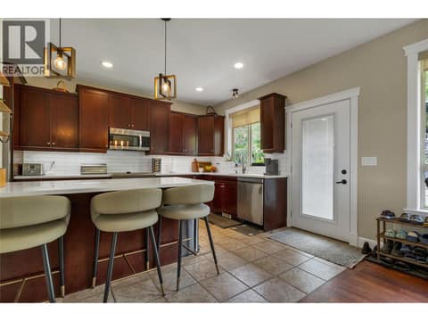 New quarts counters and tile backsplash at 1449 Red Mountain Place, Foothills, Vernon
