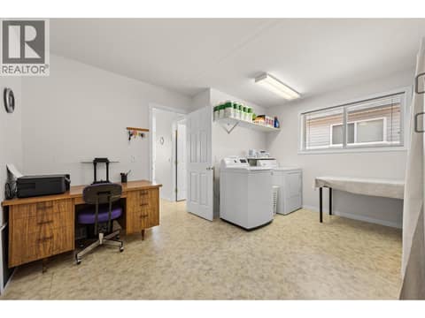 Oversized Laundry/ mudroom at 4450 Postill Drive Unit# 14, Ellison, Kelowna