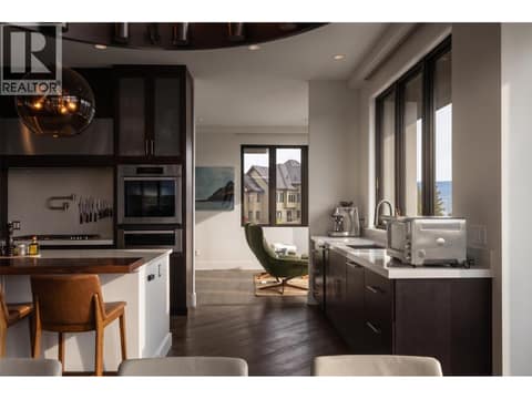 Uncompromising luxury finishes. Equipped with premium Miele wall ovens, built-in espresso machine, steam oven, convection microwave, a butler's pantry, and a dedicated coffee room. at 162 Skyland Drive, Wilden, Kelowna