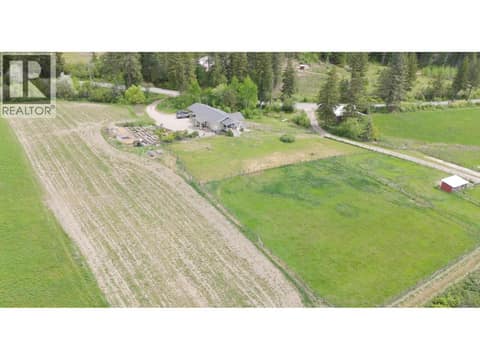 Left and right are hayfields with house and garden in the back at 270 Brash-Allen Road, Enderby / Grindrod