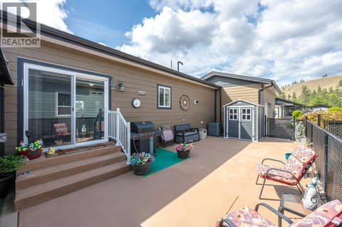 Side patio at 8300 GALLAGHER LAKE FRONTAGE Road Unit# 91, Oliver Rural