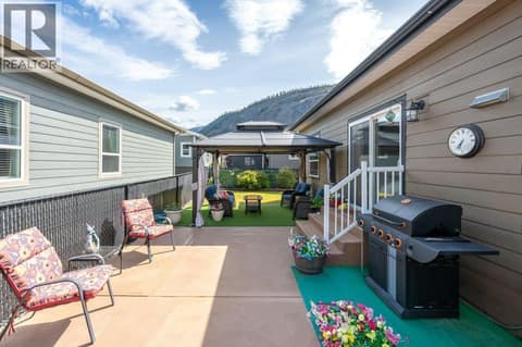 Side patio at 8300 GALLAGHER LAKE FRONTAGE Road Unit# 91, Oliver Rural
