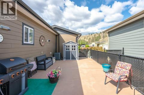 Side patio at 8300 GALLAGHER LAKE FRONTAGE Road Unit# 91, Oliver Rural