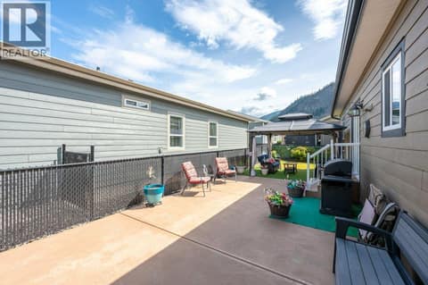 Side patio at 8300 GALLAGHER LAKE FRONTAGE Road Unit# 91, Oliver Rural