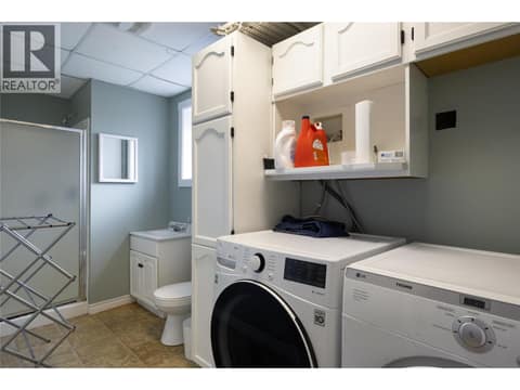 3 piece bathroom downstairs with laundry at 5712 6 Highway, Lavington, Vernon
