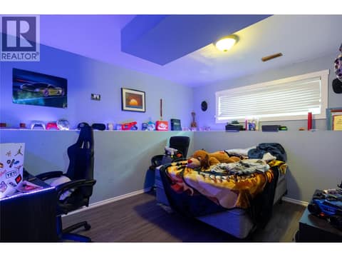 Bedroom 4 downstairs at 5712 6 Highway, Lavington, Vernon