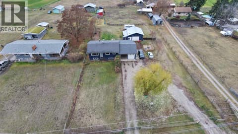 Front aerial view at 5712 6 Highway, Lavington, Vernon