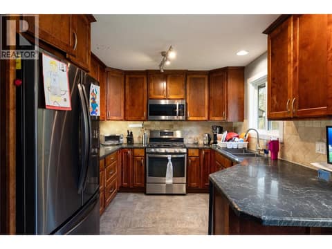 Main floor kitchen at 5712 6 Highway, Lavington, Vernon