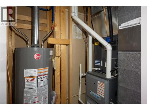 Mechanical room - updated AC, Furnace, HW Tank in 2022 at 5712 6 Highway, Lavington, Vernon