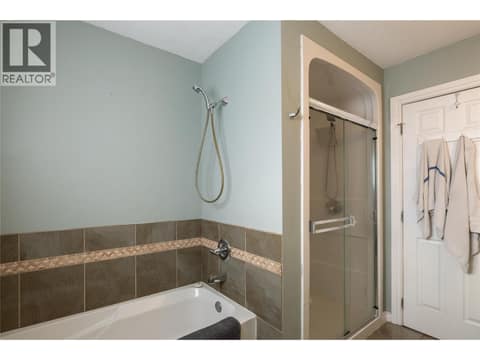 Tub with separate walk in shower at 5712 6 Highway, Lavington, Vernon