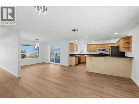 Open kitchen with dining room at 2850 Evergreen Drive, Wiltse/Valleyview, Penticton