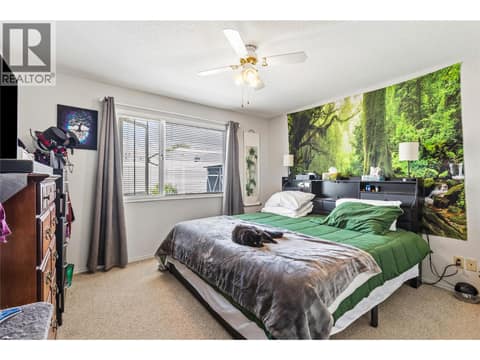 Spacious primary bedroom featuring plenty of room for a king-sized suite and a relaxing retreat atmosphere. at 3900 27 Avenue Unit# 49, Westmount, Vernon