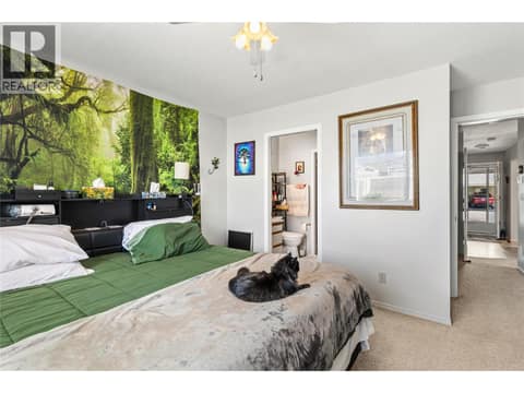 Spacious primary bedroom at 3900 27 Avenue Unit# 49, Westmount, Vernon