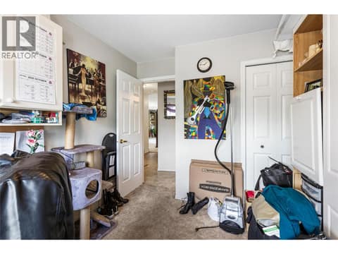 Versatile second bedroom featuring a convenient Murphy bed, making it perfect for guests or a home office. at 3900 27 Avenue Unit# 49, Westmount, Vernon