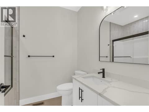 Full Bathroom with Tub Shower at 2150 Montenegro Drive, Black Mountain, Kelowna