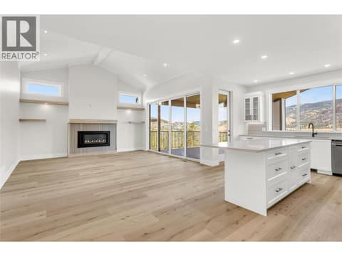 Living Room and Kitchen at 2150 Montenegro Drive, Black Mountain, Kelowna