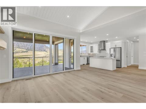 Living Room looking into Kitchen at 2150 Montenegro Drive, Black Mountain, Kelowna